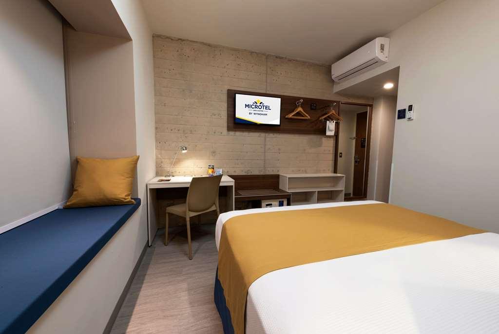 Microtel Inn & Suites By Wyndham איראפואטו חדר תמונה