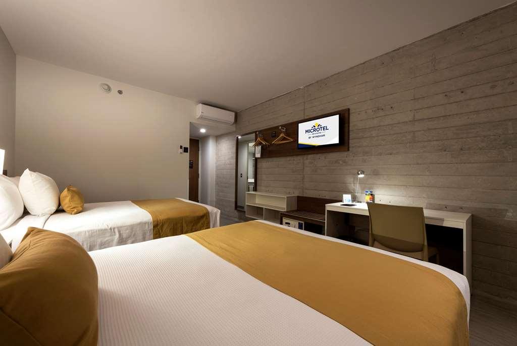 Microtel Inn & Suites By Wyndham איראפואטו חדר תמונה